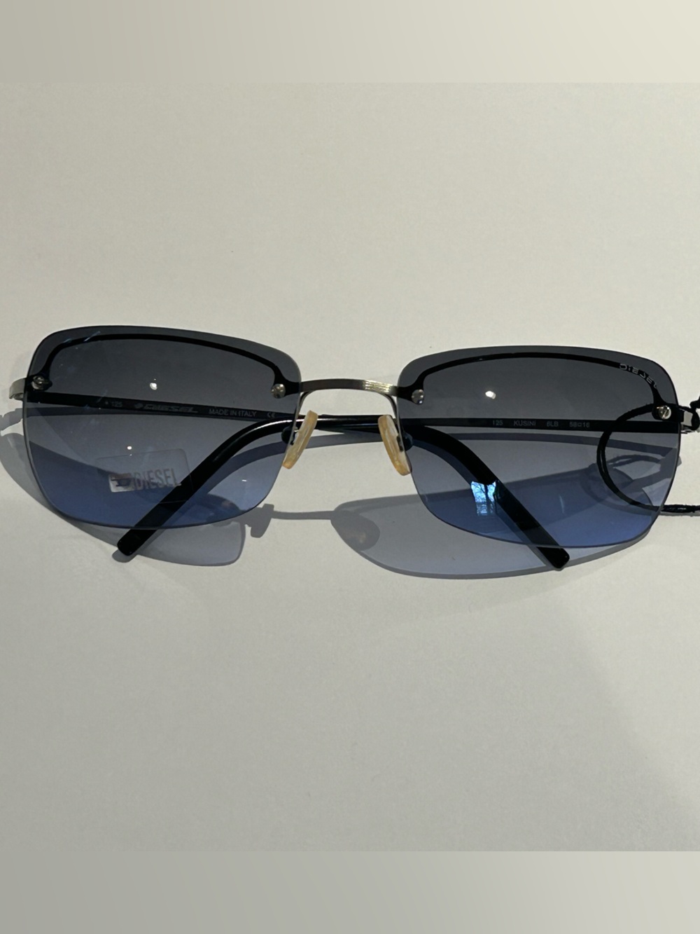 Diesel Gunmetal Frame Blue Gradient Lens Rimless Sunglasses -Kusini